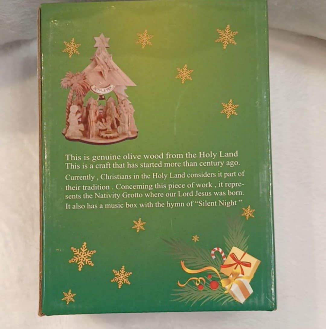 Nativity seen olive wood Hand made from the Holy Land ,came with a musical box ( silent night)