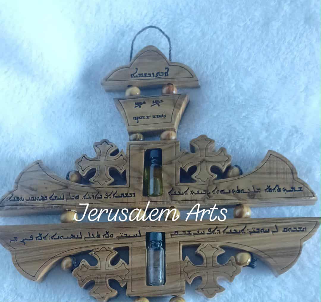 Hanging cross our father prayer Aramaic language