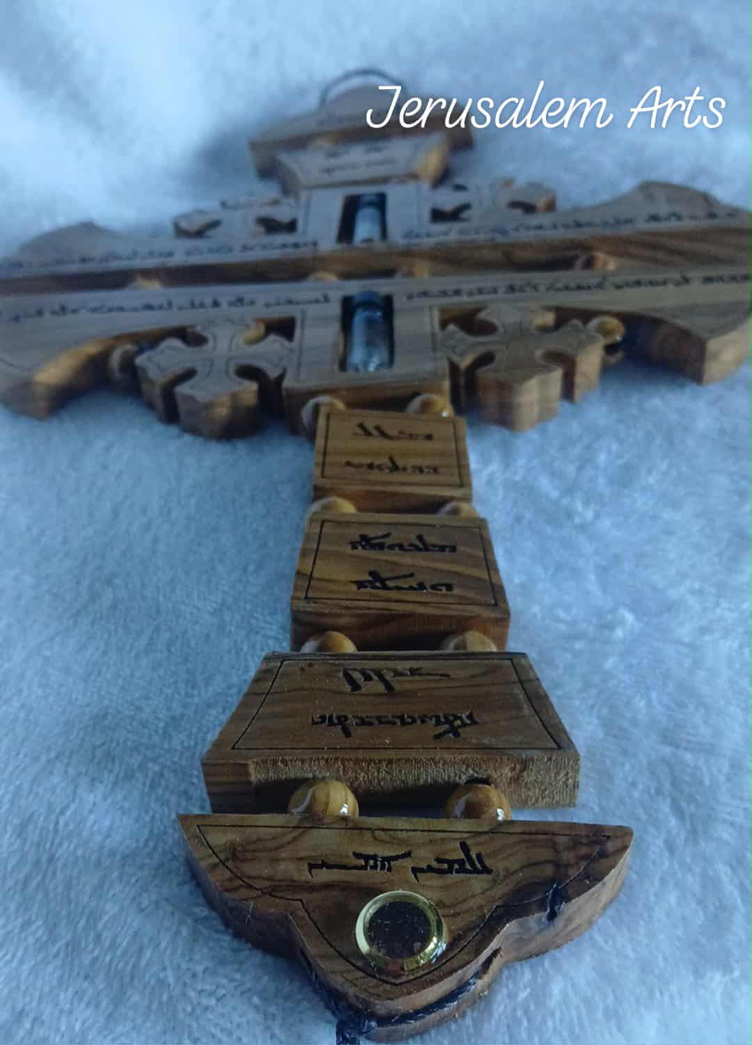 Hanging cross our father prayer Aramaic language