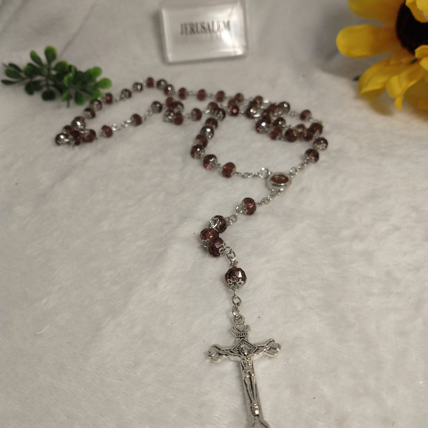 Crystal light brown rossary with Holy soil from Jerusalem .Hand made .very nice Color .this rosary for Prayer s .first Communion . Baptism.