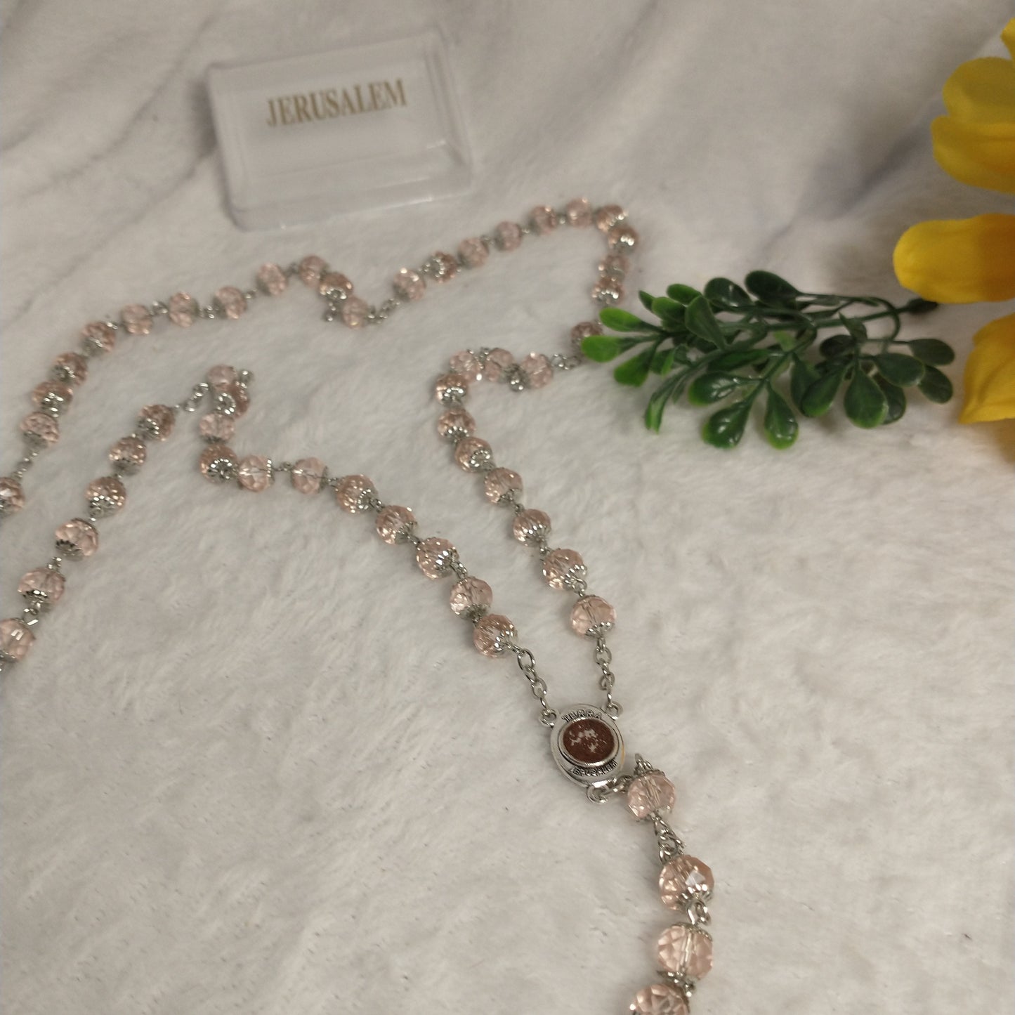 Crystal light clear pink rosary with soil from Jerusalem .hand made this rosary for pryers First Communion . Baptism