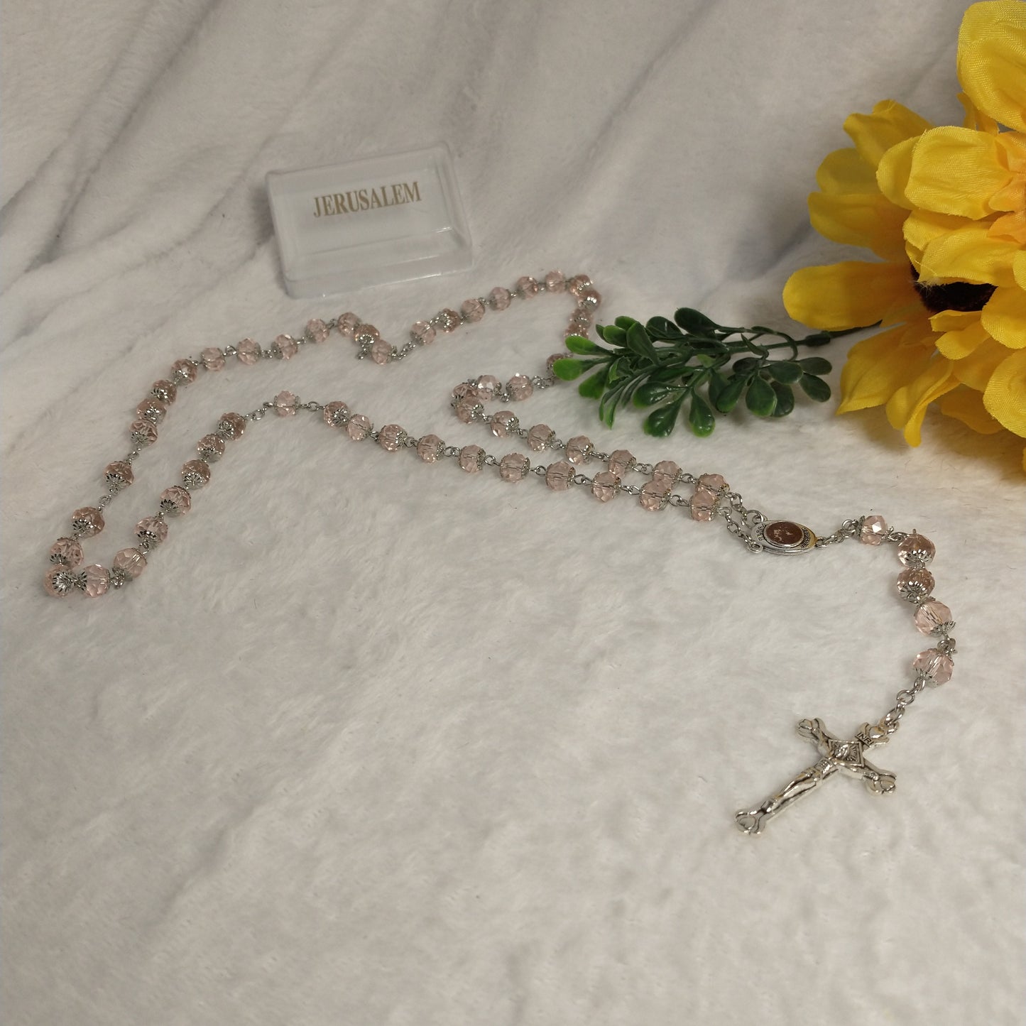 Crystal light clear pink rosary with soil from Jerusalem .hand made this rosary for pryers First Communion . Baptism