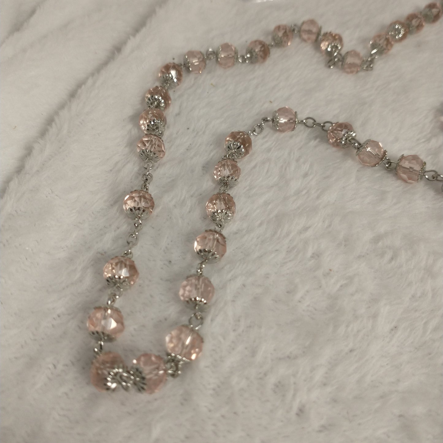 Crystal light clear pink rosary with soil from Jerusalem .hand made this rosary for pryers First Communion . Baptism