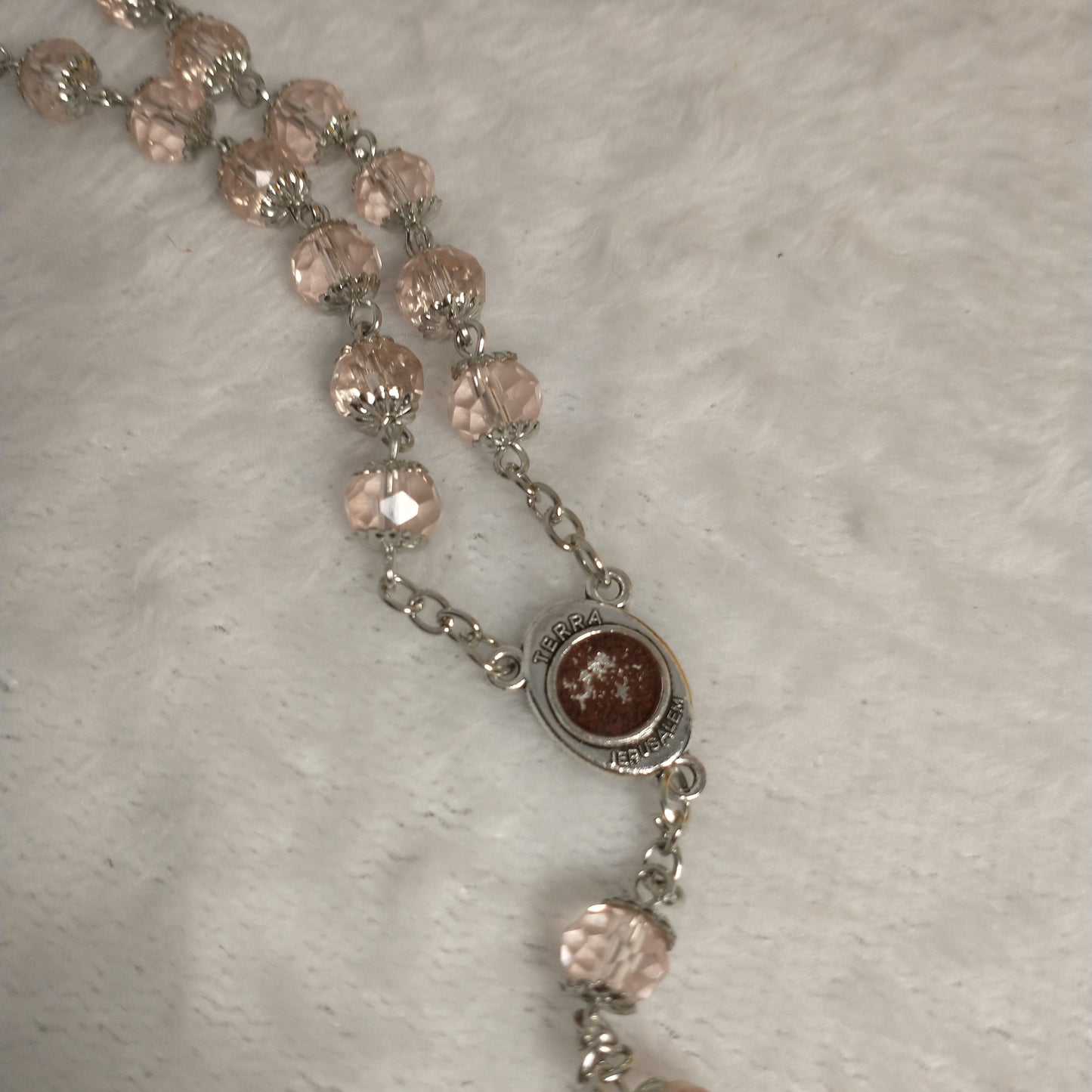 Crystal light clear pink rosary with soil from Jerusalem .hand made this rosary for pryers First Communion . Baptism