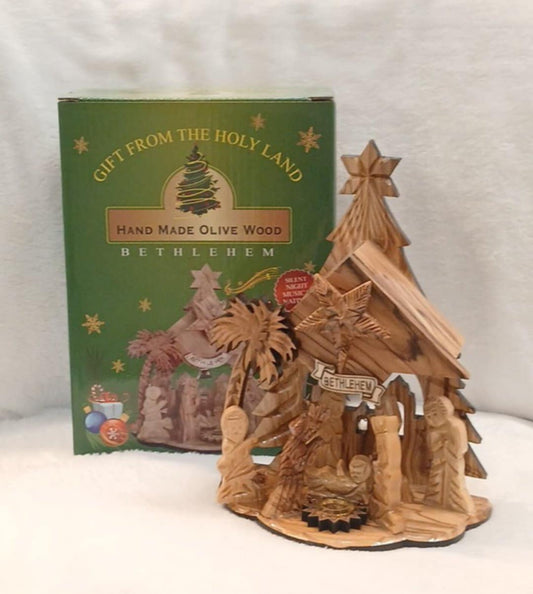 Nativity seen olive wood Hand made from the Holy Land ,came with a musical box ( silent night)