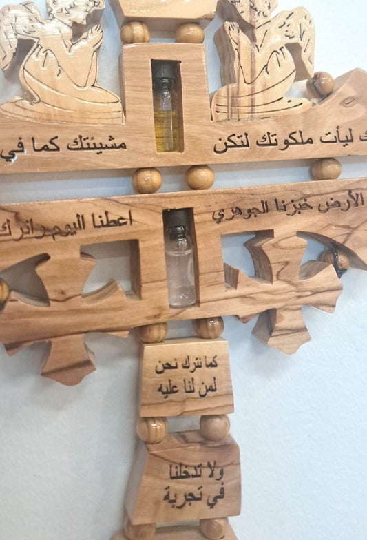 Hanging cross our father Arabic