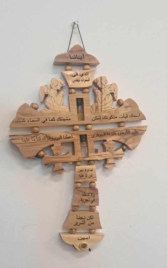 Hanging cross our father Arabic