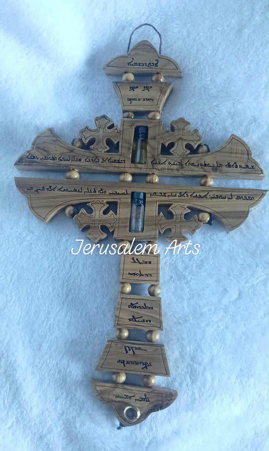 Hanging cross our father prayer Aramaic language