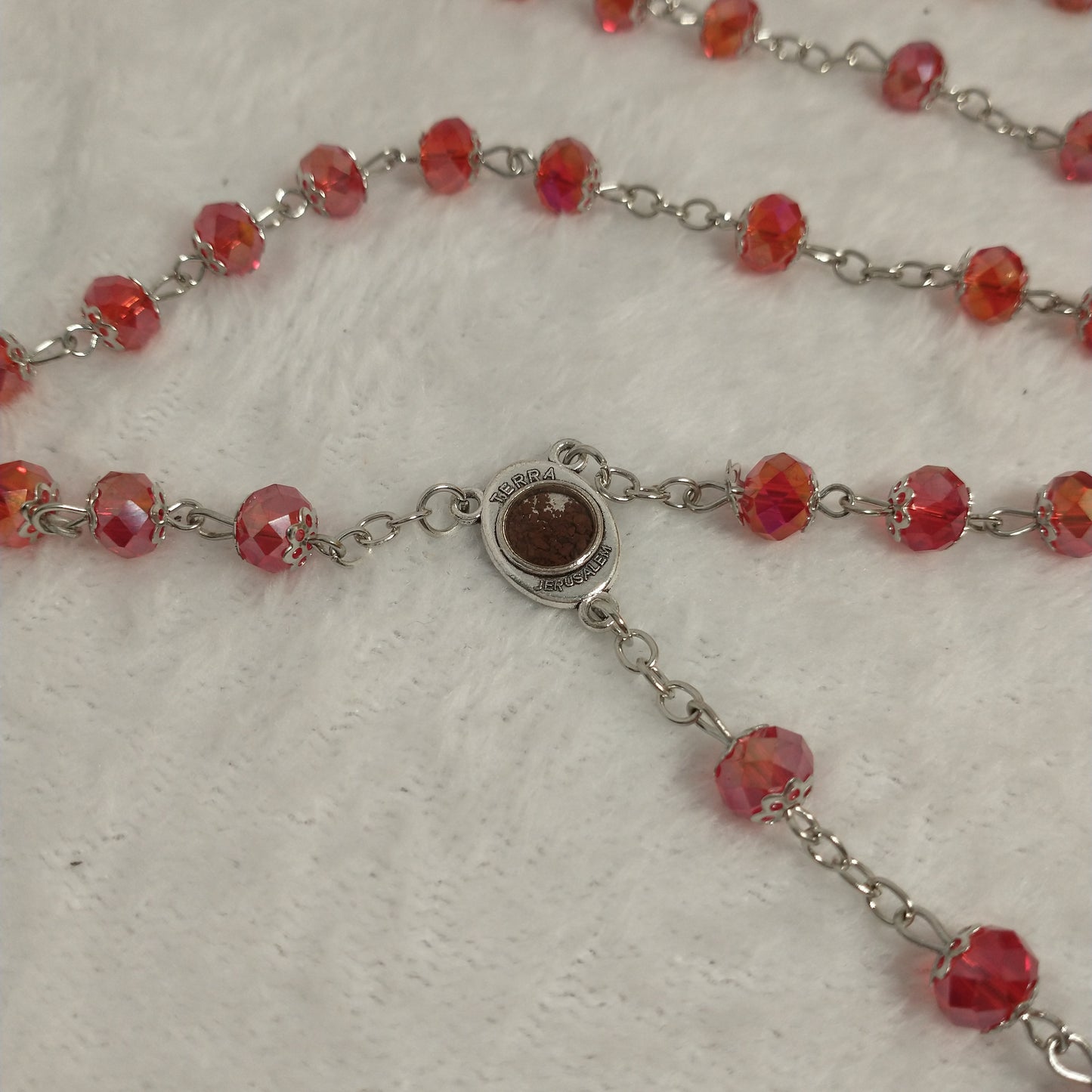 Crystal red light rosary hand made with holy soil from Jerusam .hand made for prayers .first Communion.Baptism