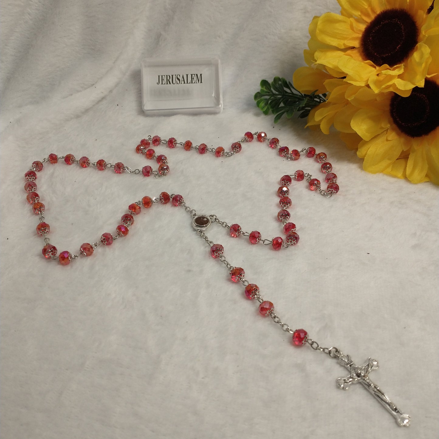 Crystal red light rosary hand made with holy soil from Jerusam .hand made for prayers .first Communion.Baptism