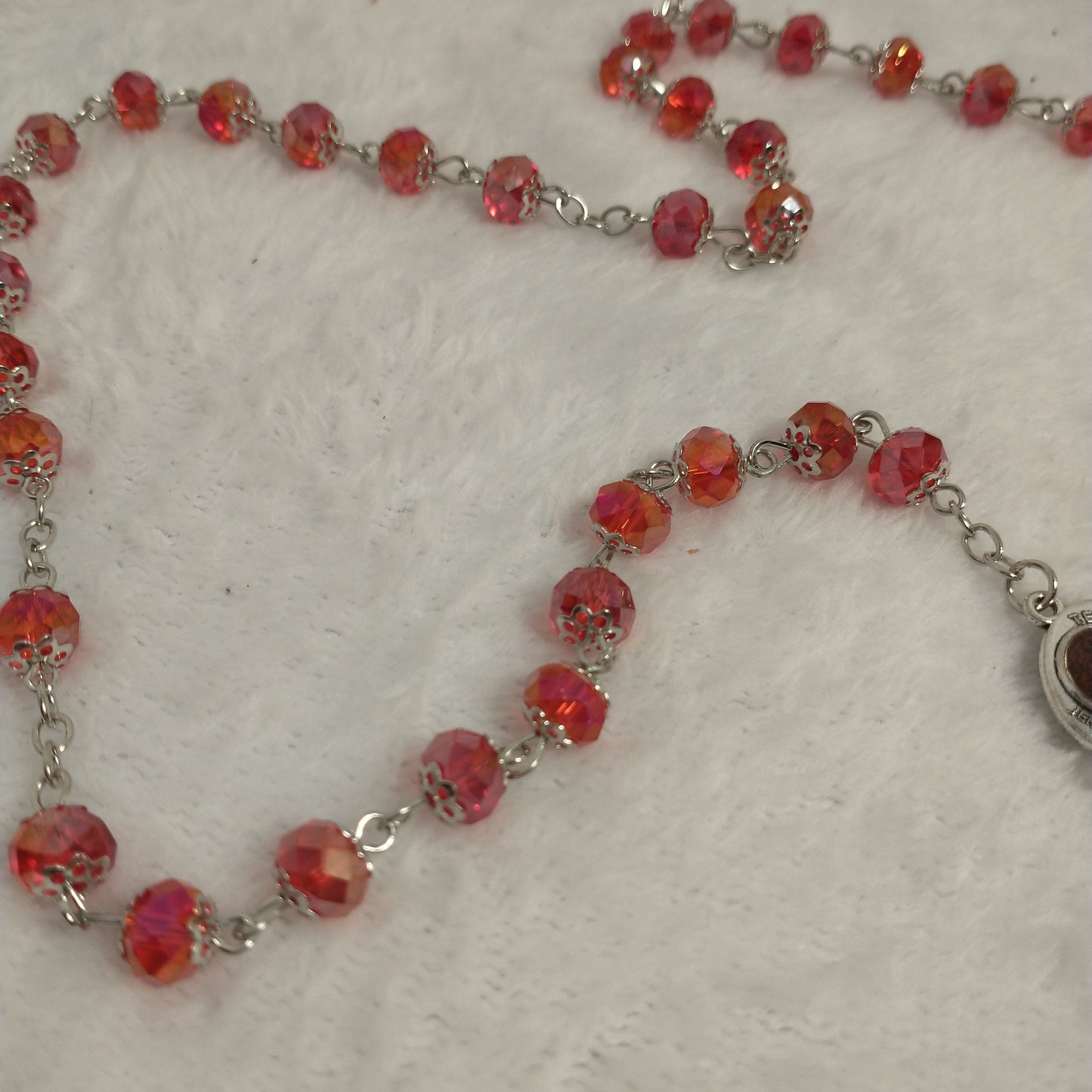 Crystal red light rosary hand made with holy soil from Jerusam .hand made for prayers .first Communion.Baptism