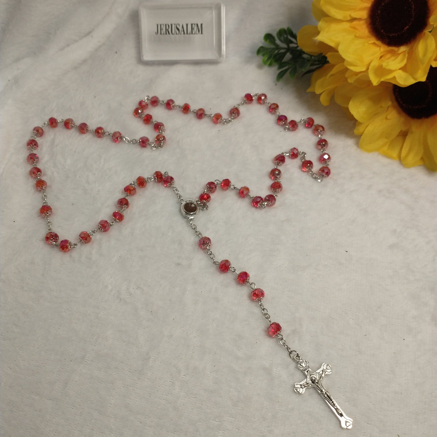 Crystal red light rosary hand made with holy soil from Jerusam .hand made for prayers .first Communion.Baptism