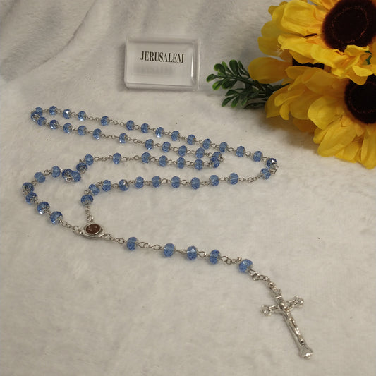 Crystal Blue light rossary very nice color .with Holy soil from Jerusalem .this rossary for prayers .first communion . Baptism