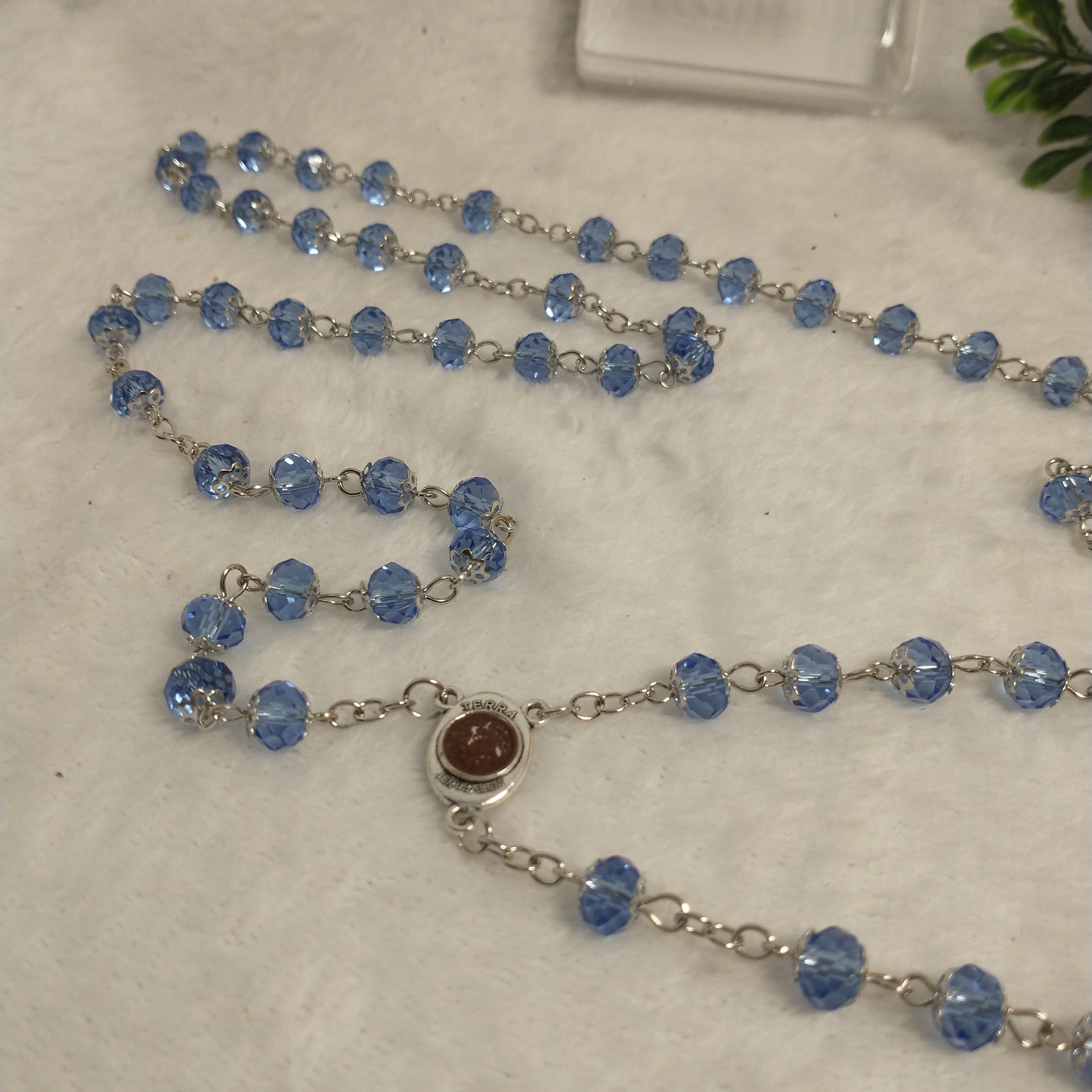 Crystal Blue light rossary very nice color .with Holy soil from Jerusalem .this rossary for prayers .first communion . Baptism