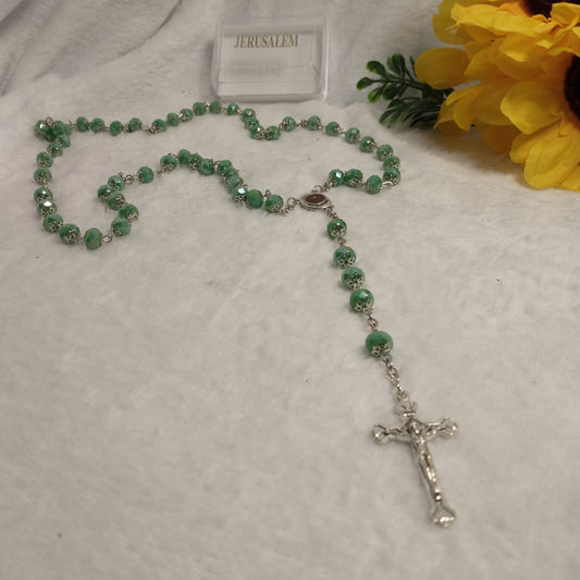 Crystal Dark green rosary so beautiful one .with holy soil from Jerusalem unique color .this rossary for prayers .first Communion . Baptism