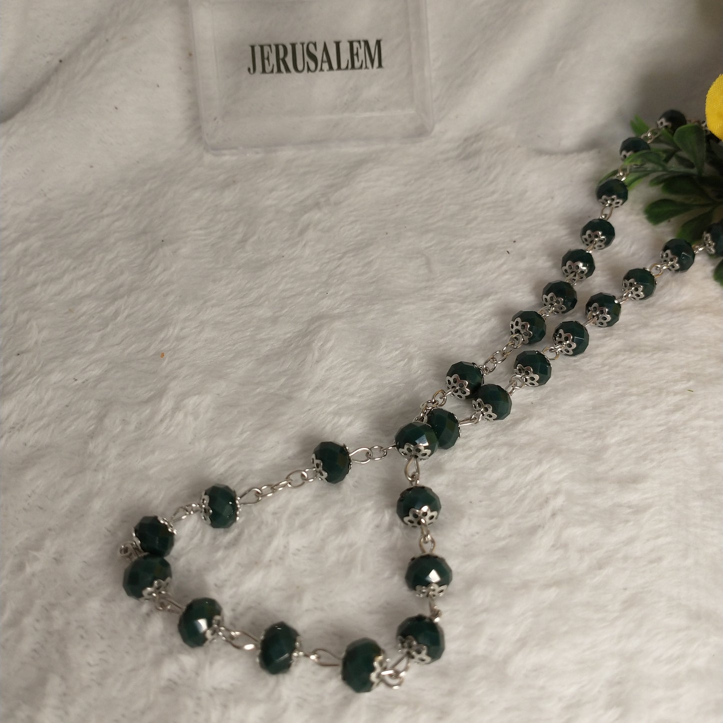 Crystal too Dark green colors hand made .with holy soil from Jerusalem . This rossary for prayers .first communion . Baptism