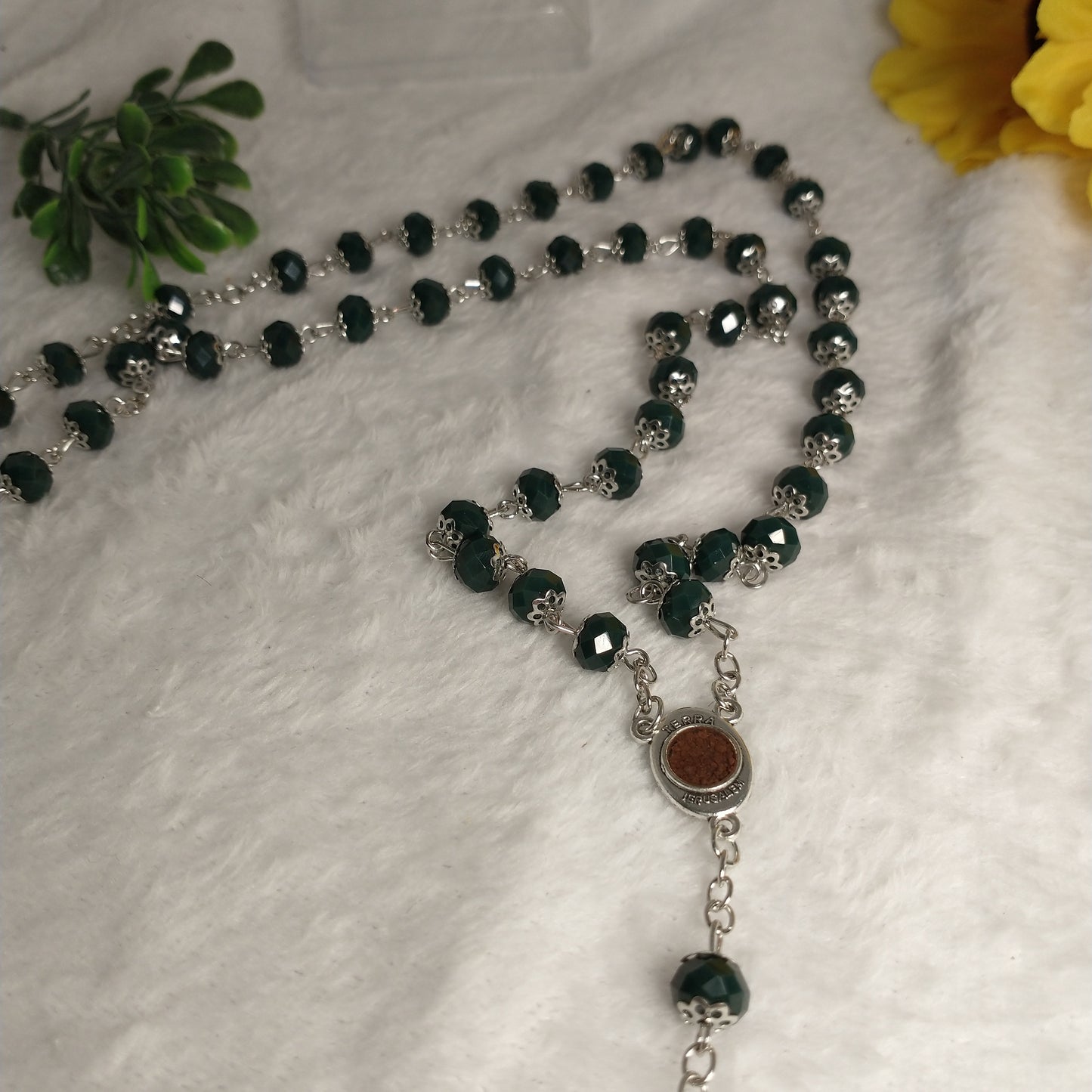 Crystal too Dark green colors hand made .with holy soil from Jerusalem . This rossary for prayers .first communion . Baptism