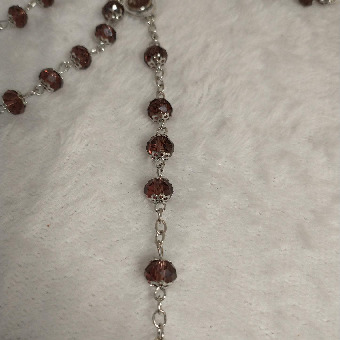 Crystal light brown rossary with Holy soil from Jerusalem .Hand made .very nice Color .this rosary for Prayer s .first Communion . Baptism.