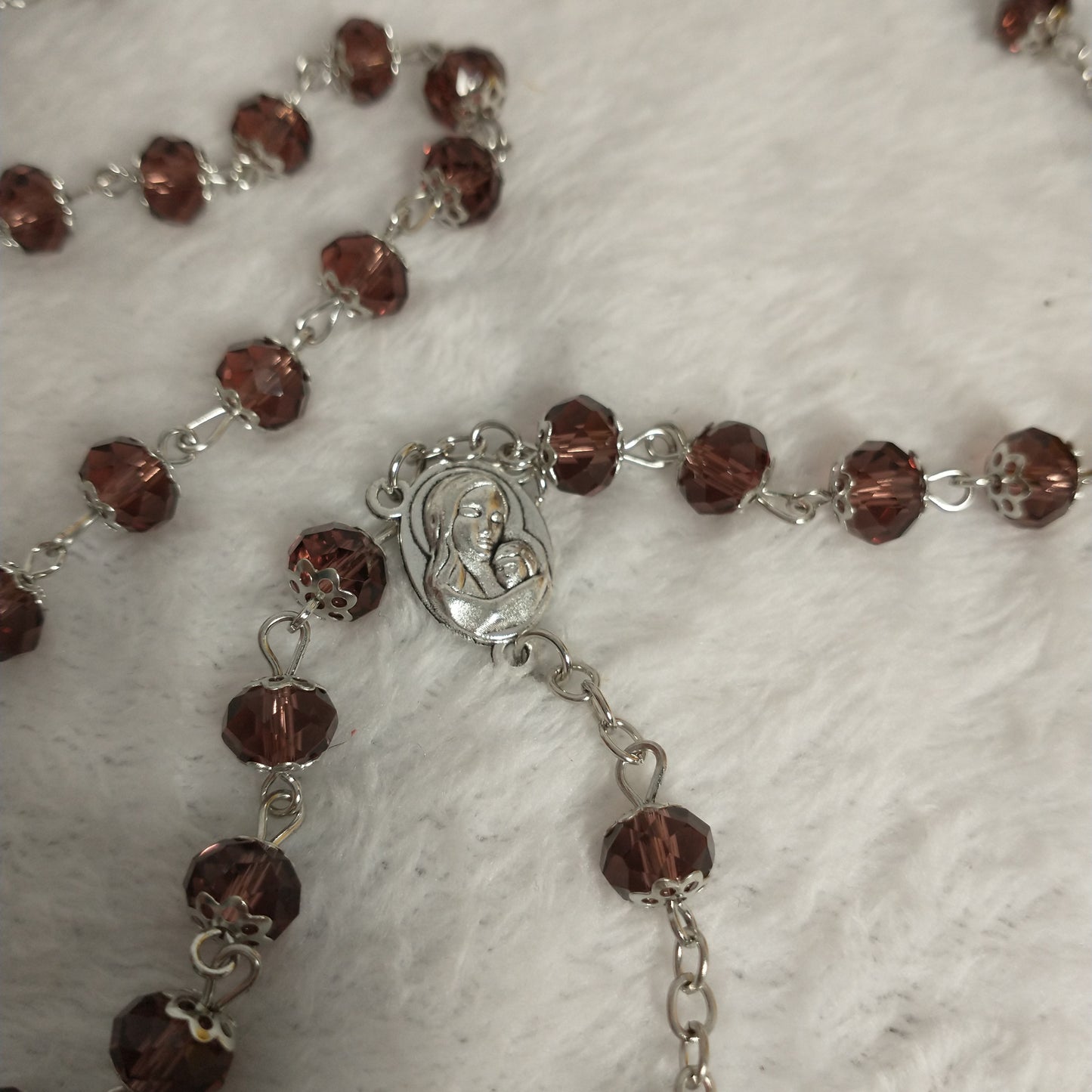 Crystal light brown rossary with Holy soil from Jerusalem .Hand made .very nice Color .this rosary for Prayer s .first Communion . Baptism.