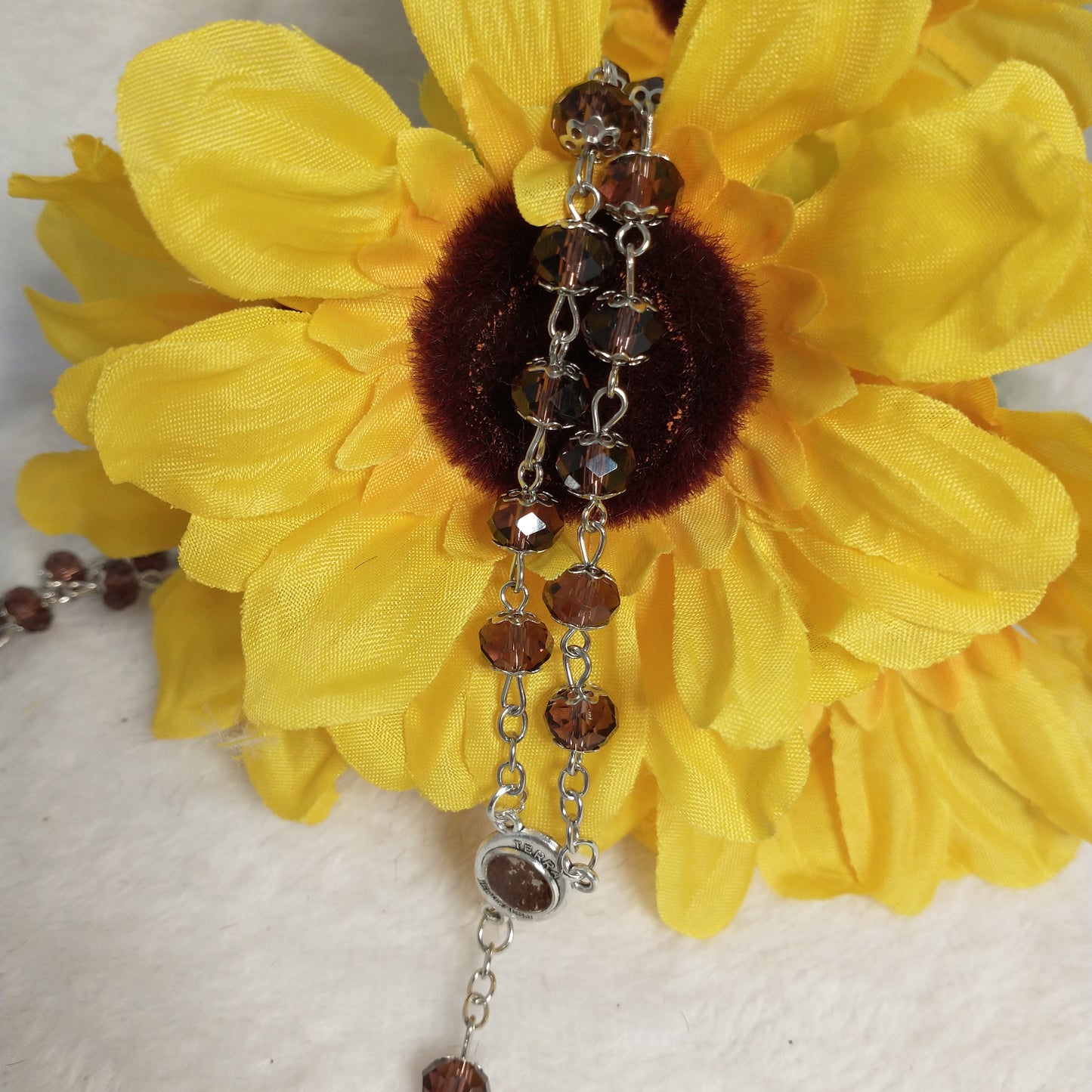 Crystal light brown rossary with Holy soil from Jerusalem .Hand made .very nice Color .this rosary for Prayer s .first Communion . Baptism.