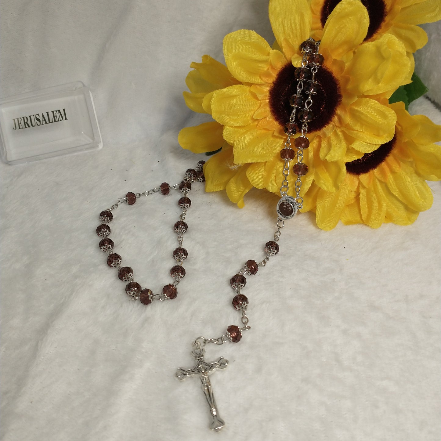 Crystal light brown rossary with Holy soil from Jerusalem .Hand made .very nice Color .this rosary for Prayer s .first Communion . Baptism.