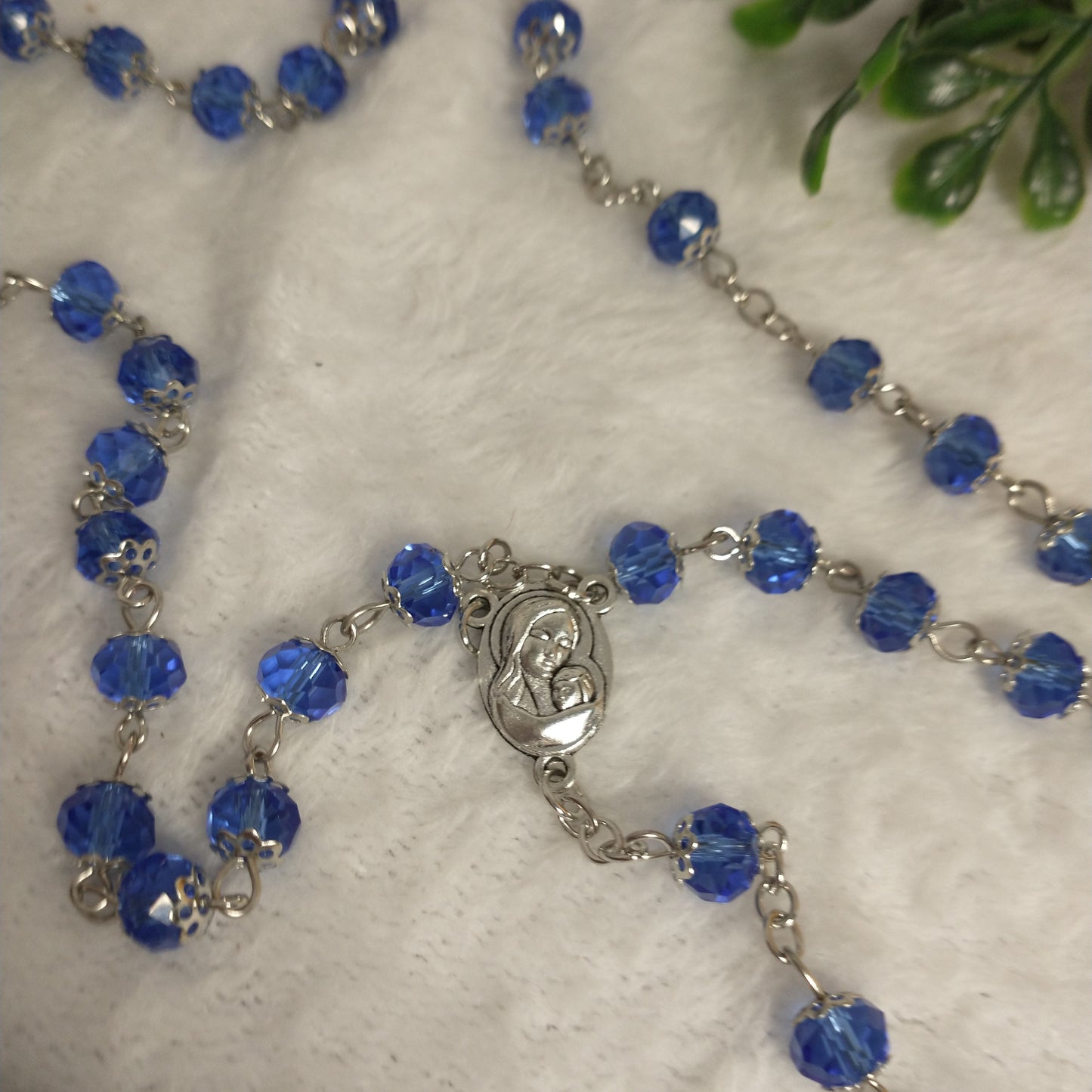 Crystal light blue color with Holy soil from Jerusalem .hand made .this rosary for prayers .first Communion . Baptism