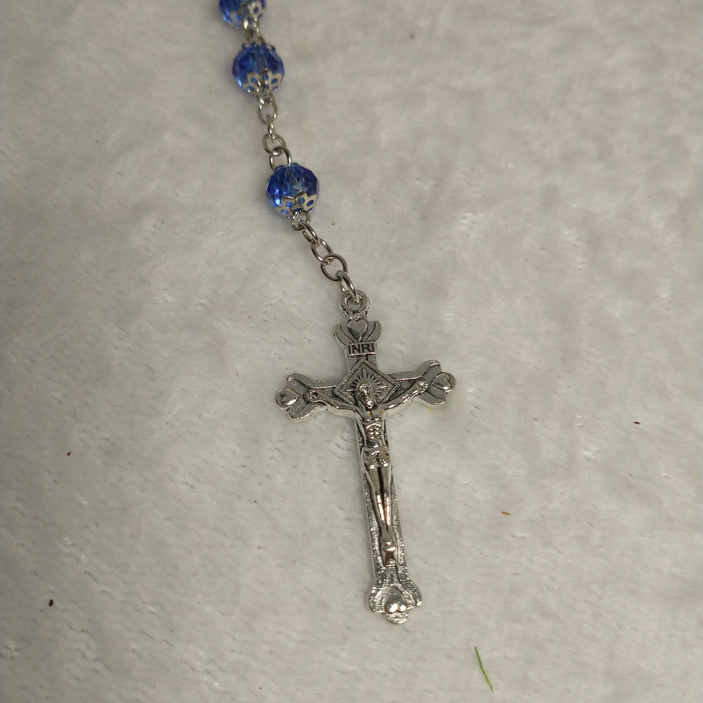 Crystal light blue color with Holy soil from Jerusalem .hand made .this rosary for prayers .first Communion . Baptism