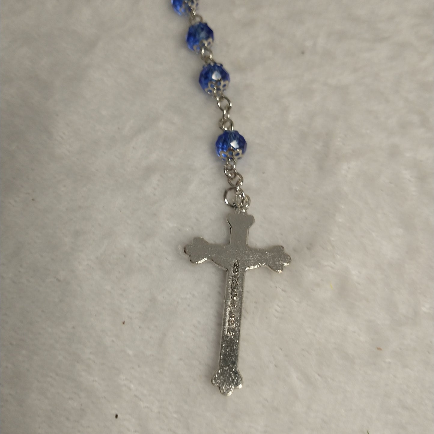 Crystal light blue color with Holy soil from Jerusalem .hand made .this rosary for prayers .first Communion . Baptism