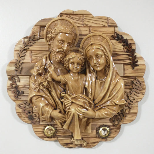 The Holy Family , Olive wood ,hand made in Bethlehem/ Holyland .